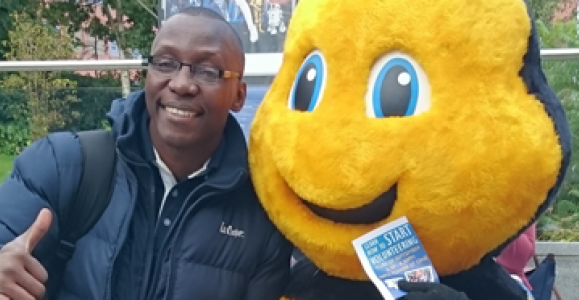 Evans Baines-Johnson poses with bee mascot Evans Baines-Johnson poses with bee mascot