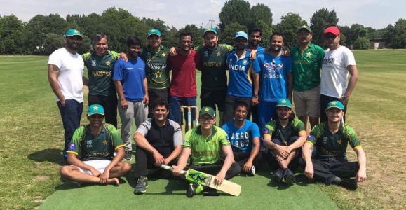 Indian and Pakistani scholars play cricket Indian and Pakistani scholars play cricket